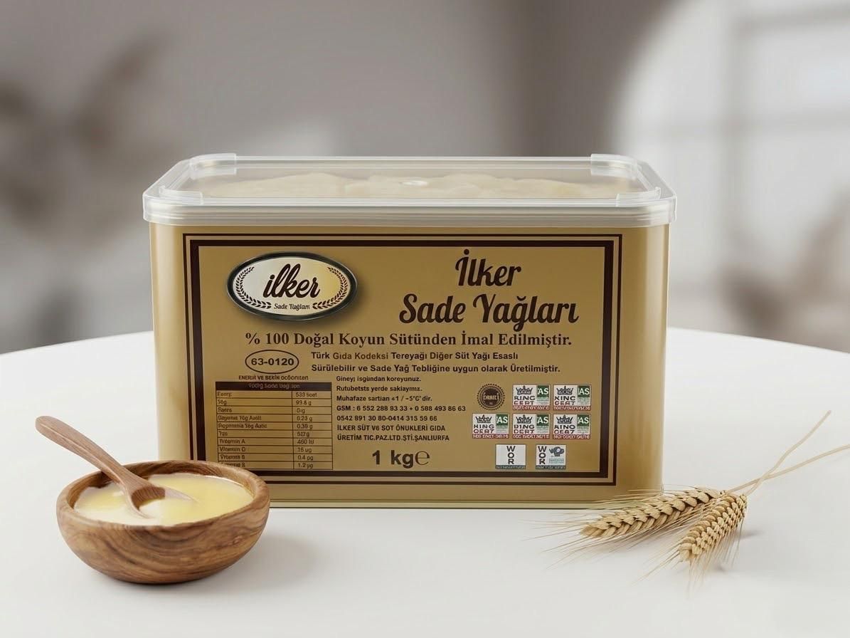 İlker ghee tin from 100% natural sheep’s milk, ghee in a wooden bowl and wheat stalks